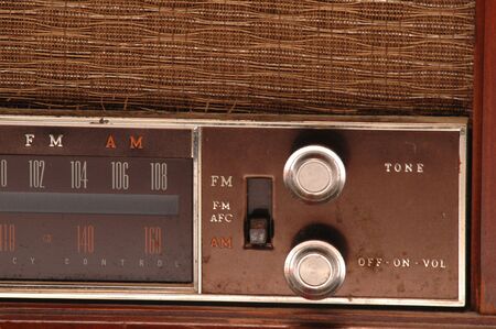 dials on an antique am-fm radioの写真素材