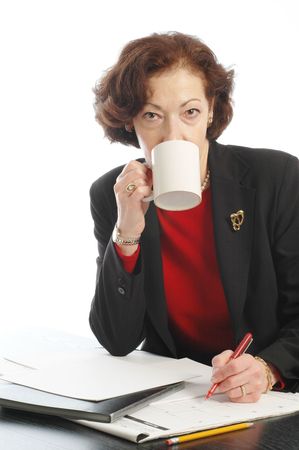drinking coffee at desk 711の写真素材