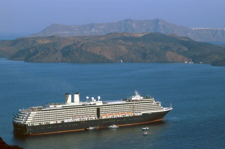 cruise ship in harbor santorini greek islandsの写真素材