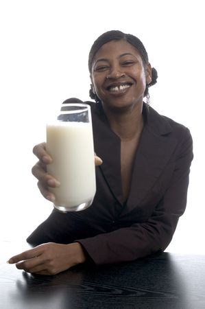 beautiful black woman with glass of milkの写真素材