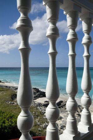 deck with railing in sunlight over the beautiful sea ocean
