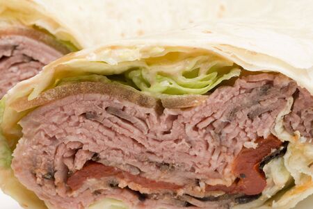roast beef pita wrap sandwich with lettuce tomotoesの写真素材