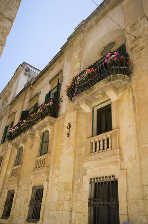 casa iguanez palace mdina malta architecture detail with flowersの写真素材