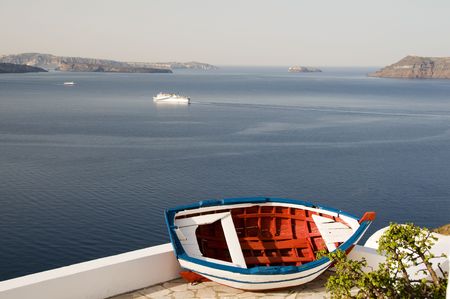 old wood fishing boat caldera view mediterranean aegean sea oia ia santorini greek islands greeceの写真素材