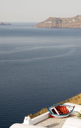 old fishing boat over the caldera view santorini oia ia aegean sea greek islands greeceの写真素材