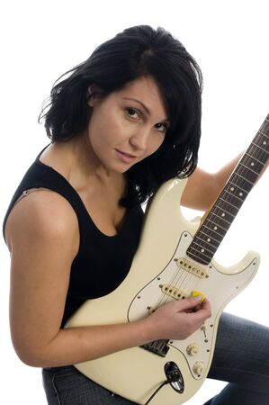 sexy young woman playing guitar smiling entertainer performerの写真素材