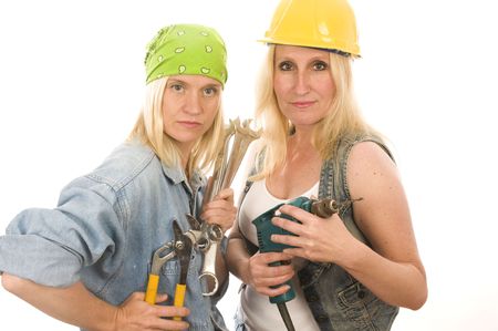 group of sexy contractor or builder or homemaker females construction workers with electric power toolsの写真素材