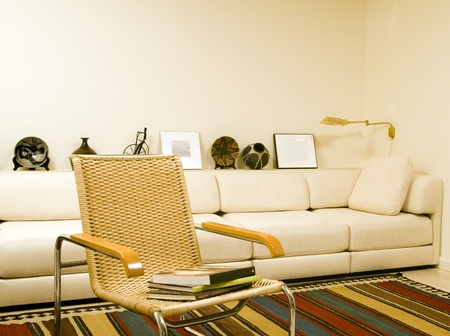 Southwestern style living room with artwork and comfortable chair for reading