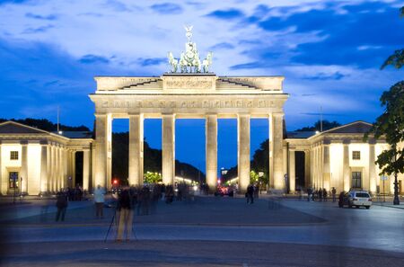 night scene Brandenburg Gate lit with lights Berlin Germany Europeの写真素材