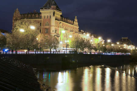 PRAGUE, CZECH-REPUBLIC-OCT. 18: Historic buildings are seen in Prague, Czech-Republic with traffic movement of cars and trams along the highway by Vlatava River on Oct. 18, 2013.のeditorial素材