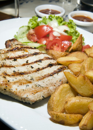 Polish style grilled pork chops meal as photographed in Krakow Poland Europeの写真素材