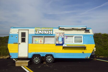 MONTAUK, NY-JUNE 8: A lemonade and ice cream wagon is seen in parking lot in Montauk, New York by popular surfing Ditch Plains Beach on June 8,2018.のeditorial素材