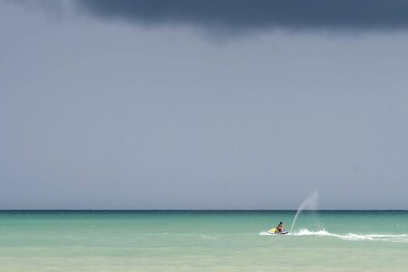 An aquatic motorbike alone at a turquoise water, Phuket Island, Thailand