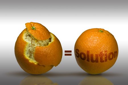 Concept image with two oranges to depict solutionsの写真素材