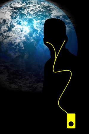 Man with MP3 player and planet in backgroundの写真素材