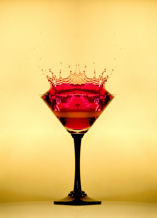alcohol water crown in cocktail glassesの写真素材