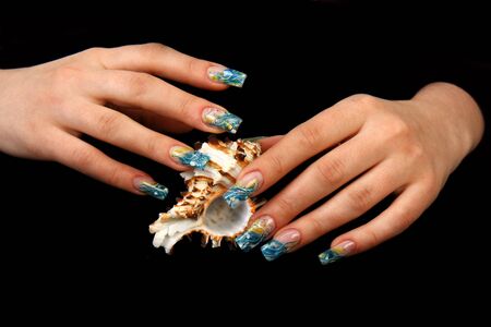 Nails Human fingers with long fingernail and beautiful manicureの写真素材