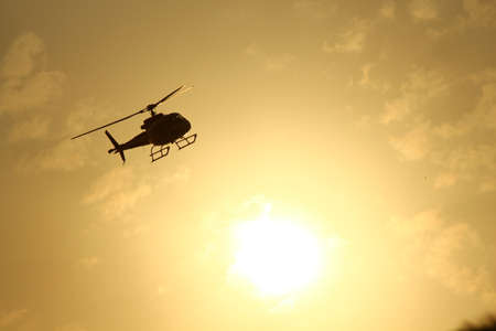 Fling Helicopter in the skyの写真素材