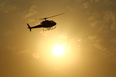 Fling Helicopter in the skyの写真素材