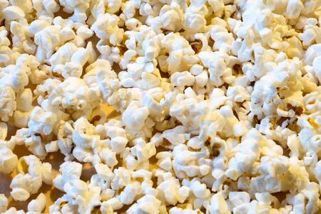 tight photo of popcorn spread out flat.