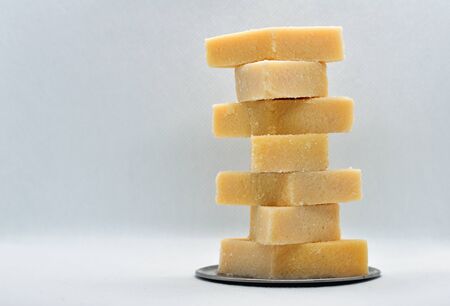 kaju katli Cut in diamond shapes, the rich texture of these desserts render a sweet and nutty feel to the mouths.の写真素材