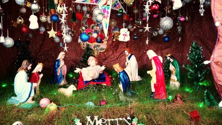 Christmas banner. Background Xmas design of sparkling lights, garland, with realistic gifts box, black snowflake and glitter gold confetti. Horizontal Christmas poster, greeting cards, headers, websitの写真素材