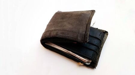 Oldest money purse with dirty and white backgroundの写真素材