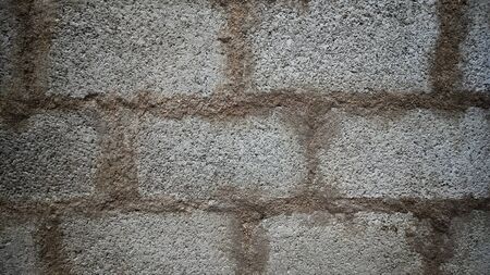 A strong concrete wall with dark and white colorsの写真素材