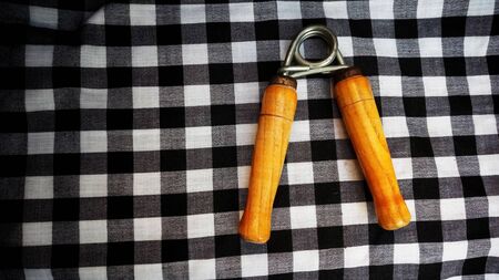 Hand grip exercises for forearm development with black and white combination backgroundの写真素材