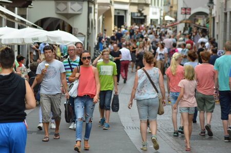 Bolzano, Italy - July 29, 2015: Tourists and shoppers fill the city of Bolzano during summertimeのeditorial素材