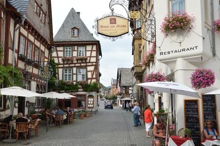 Bacharach, Germany - August 23, 2015: Tourists walking through old streets in Bacharch at river rhineのeditorial素材