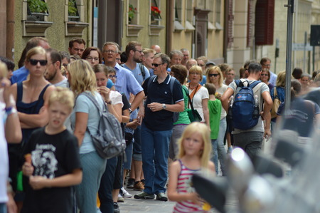 Bolzano, Italy - July 29, 2015: Tourists waiting in line in front of south tyrol museum of archaeology to see Iceman Oetziのeditorial素材