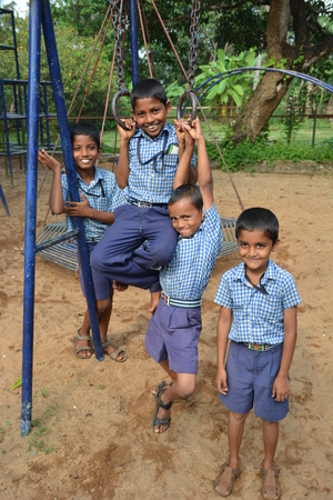Mumbai, India - October 28, 2015 - Children from children«s home playing on playground powered by charity project based in Europeのeditorial素材