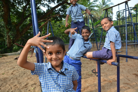 Mumbai, India - October 28, 2015 - Children from children«s home playing on playground powered by charity project based in Europeのeditorial素材