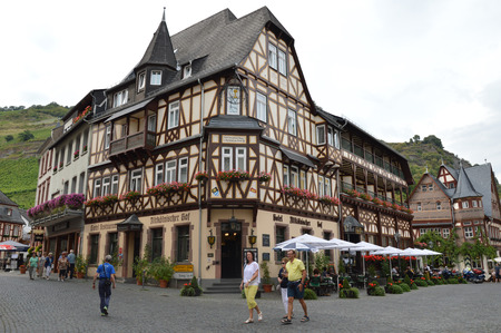 Bacharach, Germany - August 23, 2015: Tourists walking through old streets in Bacharch at river rhineのeditorial素材