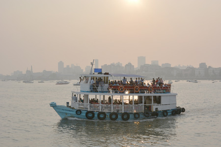 Mumbai, India - October 18, 2015 - Smog pollution in Mumbai, India seen from sea during sunsetのeditorial素材