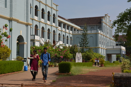 Mangalore, India - October 28, 2015 - Students walking around in St. Aloysius Collegeのeditorial素材