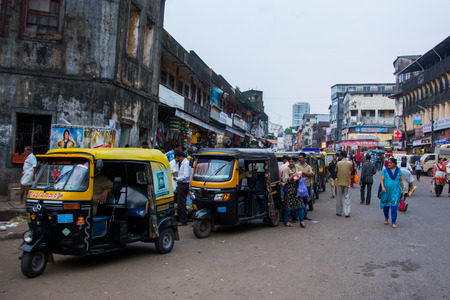 Mumbai, India - December 11, 2016 - Tuk tuks in the very crowded streets and traffic in Mumbai