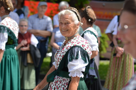 Berchtesgaden, Germany - June 5, 2017 - Old woman on traditional parade in Bavaria, Germanyのeditorial素材
