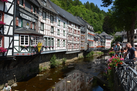Monschau, Germany - July 22, 2017: Monschau is picturesque town in the hills of the North Eifel Nature Park in Rur river valley and popular tourist destination with many well-preserved half-timbered houses in historic town center.のeditorial素材