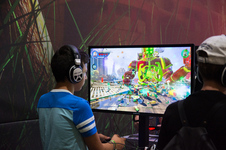 Cologne, Germany - August 26, 2017 - Young people at worlds biggest trade show for video games Gamescom in Cologne playing new games and walking aroundのeditorial素材