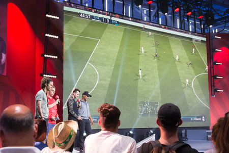 Cologne, Germany - August 26, 2017 - Professional gamer playing Fifa 18のeditorial素材