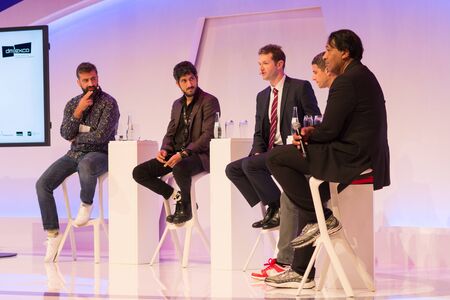 Cologne, Germany - September 19, 2017 - Young business people at digital marketing exhibition and...