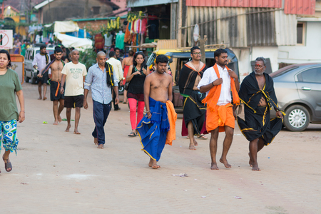 Gokarna, India - July 8, 2018 - Pilgrims typical traffic situation on indian street in Gokarnaのeditorial素材
