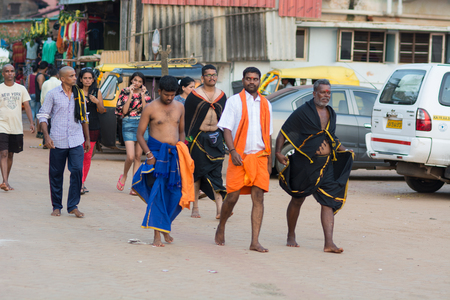 Gokarna, India - July 8, 2018 - Pilgrims typical traffic situation on indian street in Gokarnaのeditorial素材
