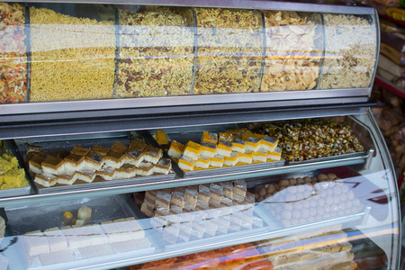 Mumbai, India - July 8, 2018 - Vendors on market selling sweets and food - Indiaのeditorial素材