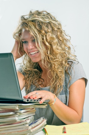 Girl looking at computerの写真素材