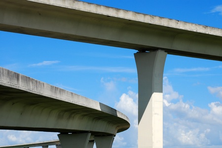 Sweeping expressway on clear blue skyの写真素材