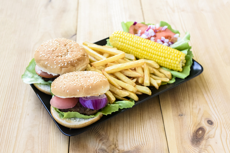 American food - hamburgers, fries, cornの写真素材