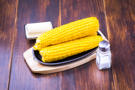 sweet corn, butter and saltの写真素材